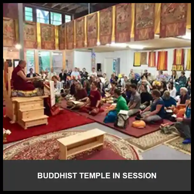 Inside image of Buddhist temple in session